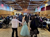 Wide shot of everyone dancing