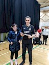 Ellie presenting Ritchie with certificate