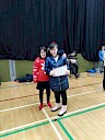 Ellie presenting Julie with certificate