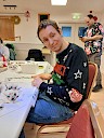 Ritchie making decorations