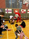 Santa delivering presents to the children at the west side group